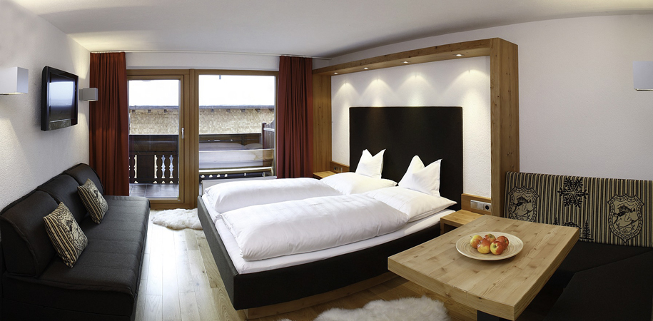 Move_Mountains_Luxury_Holidays_Austria_Tirol_Lech_am_Arlberg_Hotel_Sandhof_Deluxe_Bedroom_1.jpg